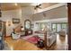 Spacious living room featuring a high ceiling, hardwood floors, and a large decorative rug at 4749 16Th Street Ne Dr, Hickory, NC 28601