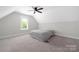 A comfortable bedroom is illuminated with natural light from a window at 5028 Lewis Rd, Gastonia, NC 28052