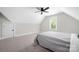 A carpeted bedroom features white trim, light gray walls, and a ceiling fan at 5028 Lewis Rd, Gastonia, NC 28052
