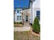 Charming home entrance features wooden steps, glass-paneled door, and a well-maintained landscape at 5028 Lewis Rd, Gastonia, NC 28052