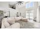 Bright open living room features high ceilings, a loft space, natural light, and modern finishes at 5028 Lewis Rd, Gastonia, NC 28052