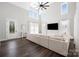 Bright and airy living room featuring high ceilings, natural light, modern finishes, and an inviting couch at 5028 Lewis Rd, Gastonia, NC 28052