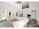 Open-concept living room boasts high ceilings, abundant natural light, modern finishes, and an overlook at 5028 Lewis Rd, Gastonia, NC 28052
