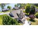Aerial view of the home featuring a deck, patio, and landscaped yard at 5933 Flintlock Ct, Hickory, NC 28601