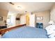 Comfortable bedroom with soft carpet, warm lighting, and neutral decor at 5933 Flintlock Ct, Hickory, NC 28601