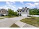 Beautiful two-story home with a spacious driveway and well-maintained landscaping in a quiet neighborhood at 6040 Fazio Ct, Harrisburg, NC 28075