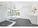 Elegant bathroom with glass shower, freestanding tub, and chandelier lighting at 632 Dorothy Dr, Charlotte, NC 28203