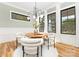Stylish dining room featuring modern lighting, hardwood floors, and comfortable seating at 632 Dorothy Dr, Charlotte, NC 28203
