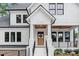 Charming white two-story home with a welcoming front porch and well-maintained landscaping at 632 Dorothy Dr, Charlotte, NC 28203