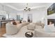 Open-concept living room with hardwood floors, fireplace, and modern décor, blending style and comfort at 632 Dorothy Dr, Charlotte, NC 28203