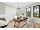 Well-lit office featuring neutral tones, a wood desk, and modern decor at 632 Dorothy Dr, Charlotte, NC 28203