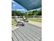 Back porch featuring outdoor seating, white fence and shaded covering at 645 E Border E Rd, Rock Hill, SC 29730