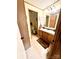 Bathroom with double vanity, wood cabinets and mirror at 645 E Border E Rd, Rock Hill, SC 29730