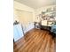 Bedroom featuring hardwood floors, closet space and a sewing machine station at 645 E Border E Rd, Rock Hill, SC 29730