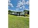 Charming single-story home with a front porch, nestled in a green lawn with flowers and a paved path at 645 E Border E Rd, Rock Hill, SC 29730