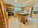 Well-equipped kitchen with stainless steel appliances, center island, and ample cabinet space at 645 E Border E Rd, Rock Hill, SC 29730