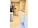 Laundry room with washer, dryer, tiled floors and water filtration system at 645 E Border E Rd, Rock Hill, SC 29730