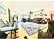 Open-concept living room features natural light, wood floors, and a comfortable seating arrangement at 645 E Border E Rd, Rock Hill, SC 29730