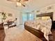 Inviting main bedroom with a large bed, accent pillows, and carpeted floors at 645 E Border E Rd, Rock Hill, SC 29730