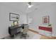 Bedroom with a modern desk, stylish decor, and a bright window at 7328 Starvalley Dr, Charlotte, NC 28210