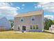 A large backyard with a patio and a view of the home's exterior at 804 Yorkshire Dr, Albemarle, NC 28001