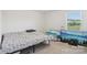 Neutral bedroom with bed and television; light-filled and comfortable at 804 Yorkshire Dr, Albemarle, NC 28001