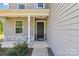 Inviting front entrance with stone accents, decorative door, and well-maintained landscaping at 804 Yorkshire Dr, Albemarle, NC 28001