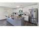 Beautiful kitchen with island, stainless steel appliances, and ample counter space at 804 Yorkshire Dr, Albemarle, NC 28001