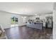 Modern kitchen with stainless steel appliances, granite countertops, and sliding glass doors at 804 Yorkshire Dr, Albemarle, NC 28001