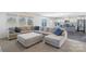 Open-concept living room and kitchen area featuring stylish decor and natural light at 804 Yorkshire Dr, Albemarle, NC 28001