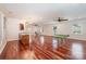 Finished basement has beautiful wood floors, bar with seating, and a ping pong table at 925 Giacomo Dr, Waxhaw, NC 28173