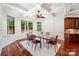 Bright dining area with cherry floors and view of exterior at 925 Giacomo Dr, Waxhaw, NC 28173