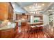 Large kitchen with a center island, modern stainless steel appliances, and granite countertops at 925 Giacomo Dr, Waxhaw, NC 28173