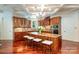 Spacious kitchen featuring an island with seating, modern appliances, and custom cabinetry at 925 Giacomo Dr, Waxhaw, NC 28173