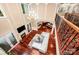 Open living room featuring a fireplace, hardwood floors, and tall ceilings at 925 Giacomo Dr, Waxhaw, NC 28173