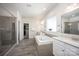 Luxurious bathroom with a soaking tub, walk-in shower, and dual vanities at 990 Nw Capwalk Nw Rd # 138, Concord, NC 28027