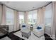 Cozy bedroom seating area with natural light and comfortable chairs at 990 Nw Capwalk Nw Rd # 138, Concord, NC 28027