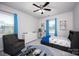 Comfortable bedroom with ample natural light, blue curtains, and cozy decor at 990 Nw Capwalk Nw Rd # 138, Concord, NC 28027
