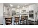 Bright kitchen with stainless steel appliances, granite countertops, and a center island with seating at 990 Nw Capwalk Nw Rd # 138, Concord, NC 28027