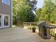 Back deck with space for entertaining includes stainless steel grill and room for table and chairs at 10716 Meg Meadow Dr, Mint Hill, NC 28227