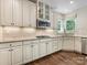 Bright kitchen with custom cabinets, stainless steel appliances, and granite countertops overlooking backyard at 10716 Meg Meadow Dr, Mint Hill, NC 28227
