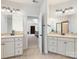 A dual sink main bathroom with a door leading to the bedroom and a shower at 10716 Meg Meadow Dr, Mint Hill, NC 28227