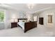Spacious main bedroom with tray ceilings and plenty of natural light at 10716 Meg Meadow Dr, Mint Hill, NC 28227