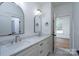 Elegant bathroom with double vanity, marble countertops, and modern fixtures, offering a spa-like experience at 108 Woodwinds St, Locust, NC 28097