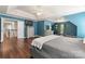 Large bedroom features hardwood floors and ample space for relaxation and rest at 125 N Wendover Trce, Mooresville, NC 28117