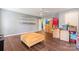 Bright living space with hardwood floors and large ottoman, ideal for storage and comfort at 125 N Wendover Trce, Mooresville, NC 28117