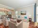 Cozy living room featuring a comfortable seating area, and adjacent dining space at 13237 Fremington Rd, Huntersville, NC 28078