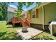 Inviting backyard with deck, patio, and well-maintained lawn, perfect for outdoor entertaining and relaxation at 139 5Th St, Huntersville, NC 28078