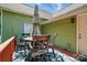 Cozy outdoor deck features a dining table, chairs, and an umbrella, ideal for enjoying meals or relaxing at 139 5Th St, Huntersville, NC 28078
