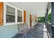 Inviting front porch with bench seating and a charming atmosphere at 139 5Th St, Huntersville, NC 28078